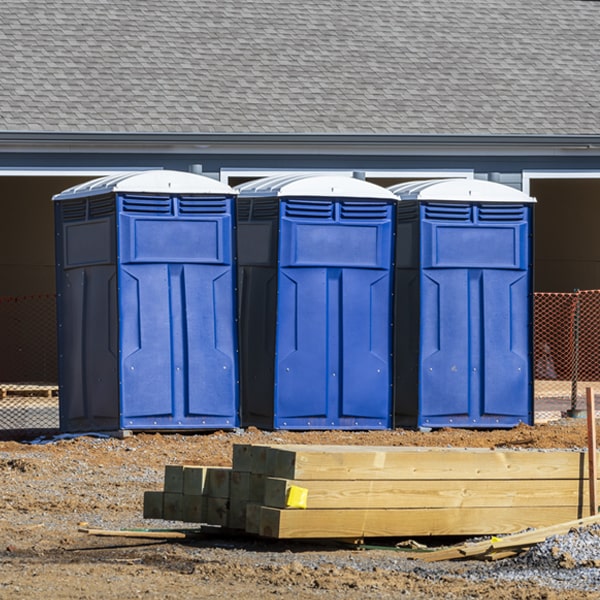 what is the cost difference between standard and deluxe portable toilet rentals in Elderon